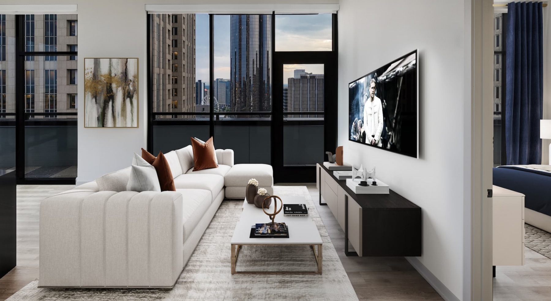 living room with city views, large windows and spacious areas